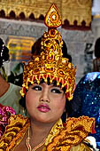 Ear piercing ceremony at Mahamuni Buddha Temple, Myanmar 